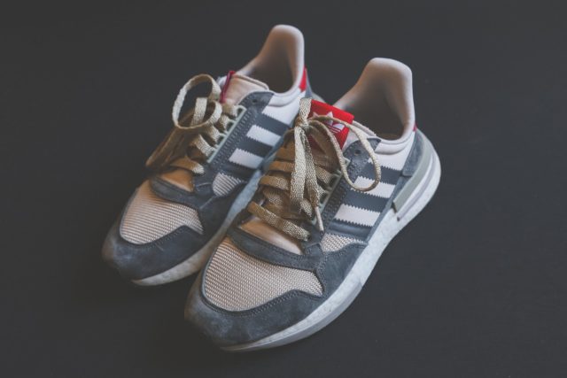 close up photo of adidas shoes