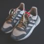 close up photo of adidas shoes