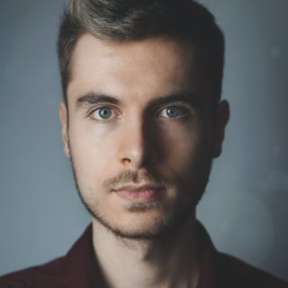 man in brown polo shirt