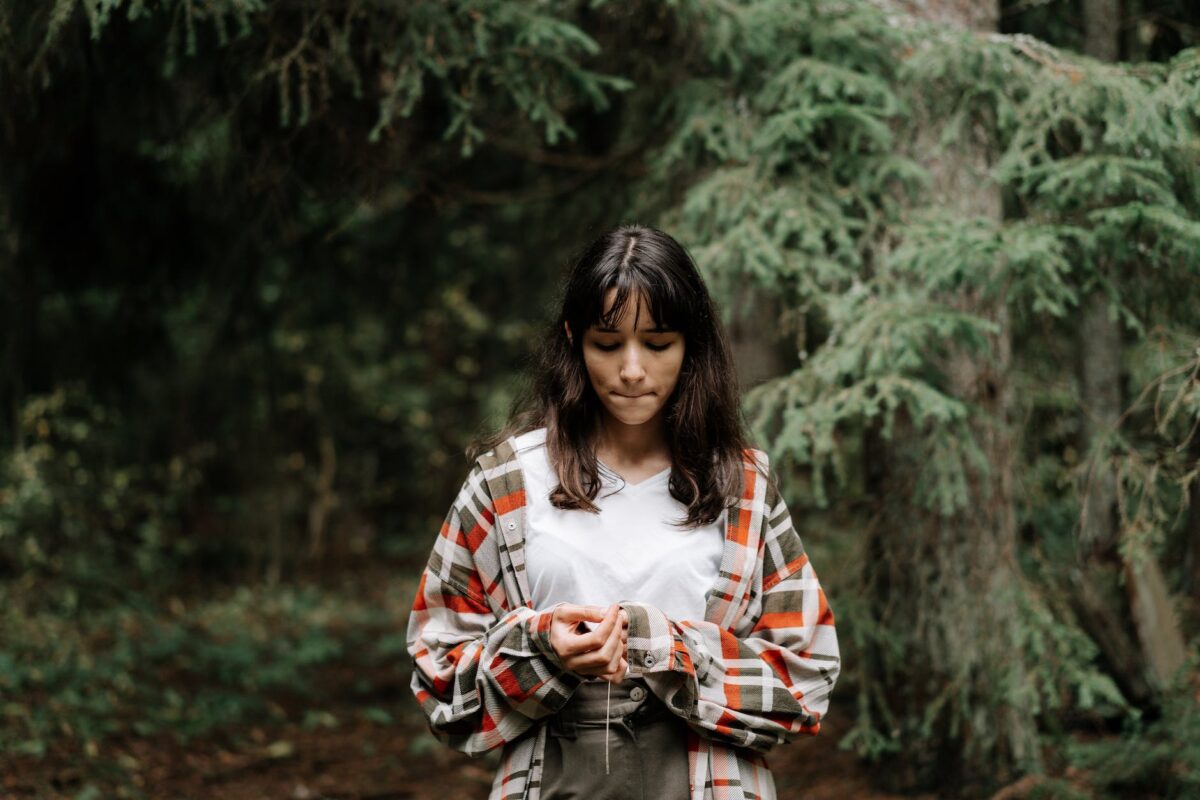 teen in a plaid jacket