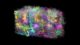Reconstrucción 3D de un milímetro cúbico de cerebro con miles de neuronas de colores sobre fondo negro